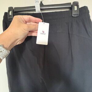 Baleaf black workout pants w/ pockets & drawstrings at ankles, new with tags